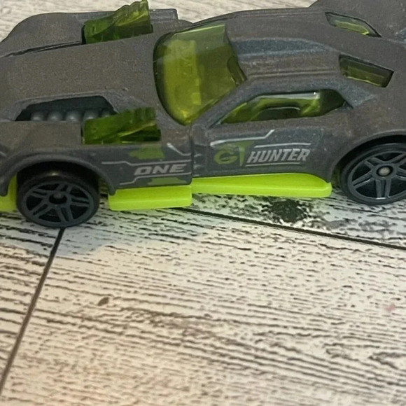 2014 Mattel Hot Wheels GT Hunter Grey Car With Florescent Green Under Carriage - Picture 7 of 9